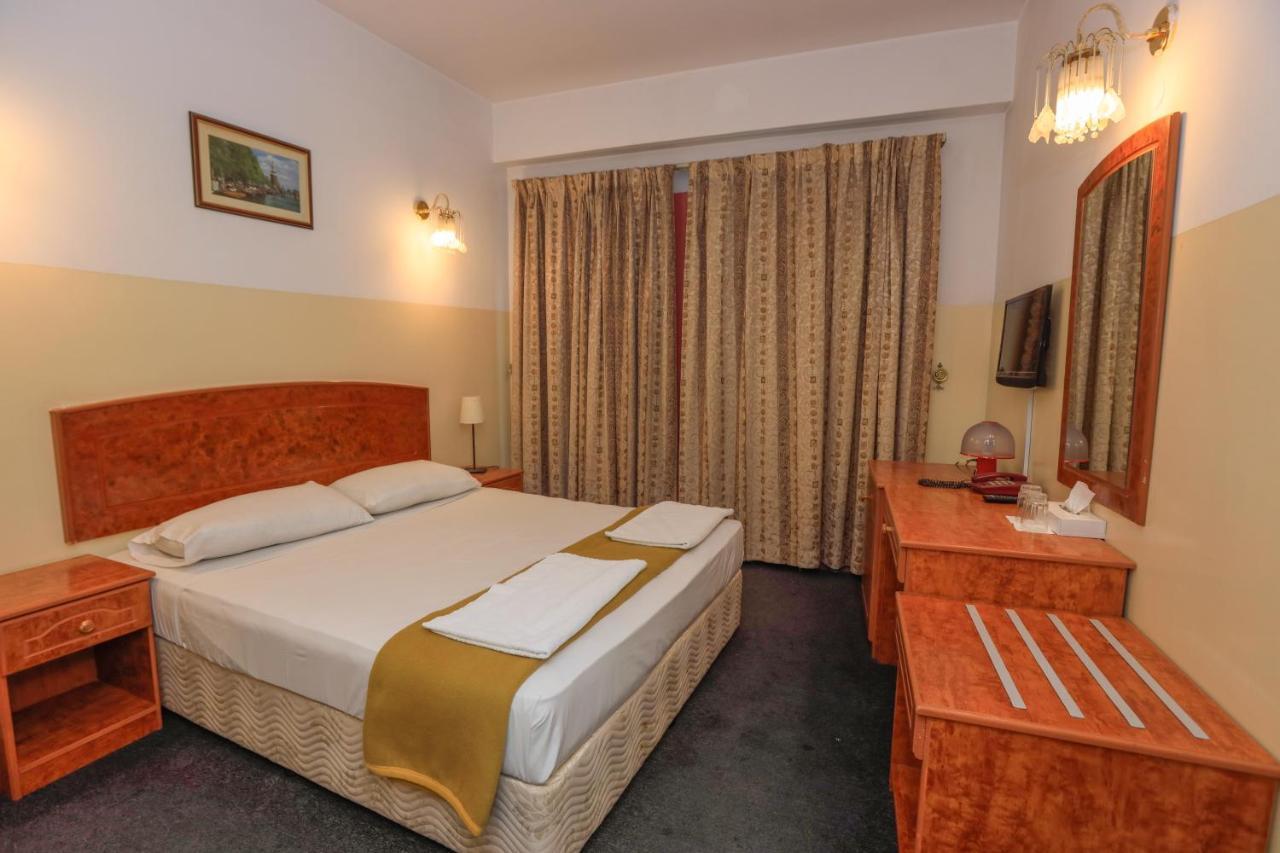 Queens Next Sabkha Bus Station Hotel