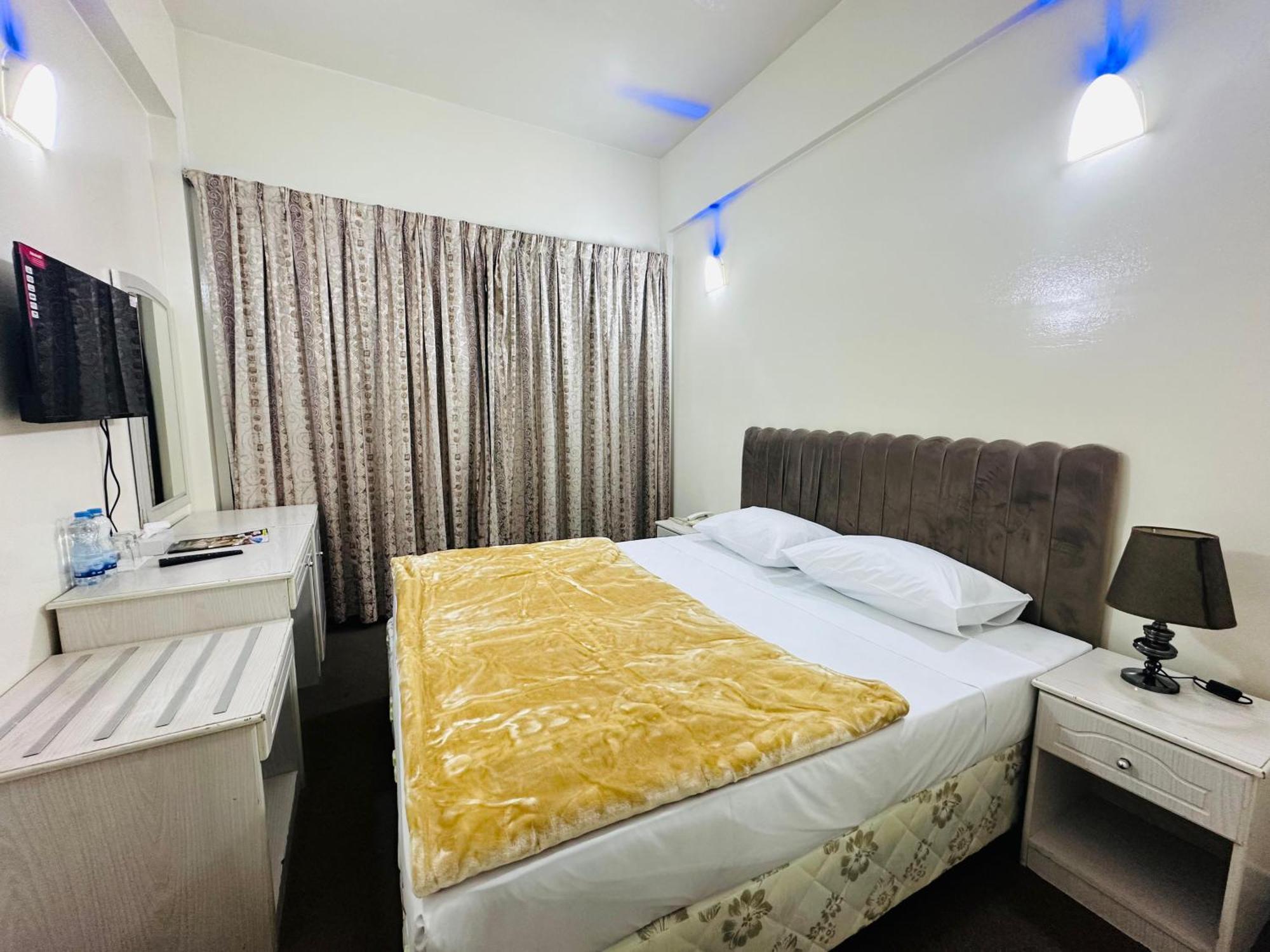 Queens Next Sabkha Bus Station Hotel